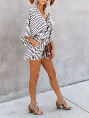Tutina con tasca e cravatta in cotone a scollo a V