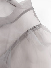 Chemisier sexy transparent à col en V et manches longues bouffantes avec nœud papillon