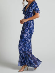 Abito lungo a maniche svolazzanti con scollo a V in motivo swirl blu navy
