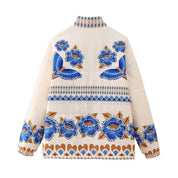 Veste à épaules tombantes et imprimé floral bleu